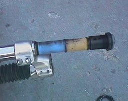 This is an "elastomer" shock. Instead of springs or air cartridges, the foam absorbs the shock.